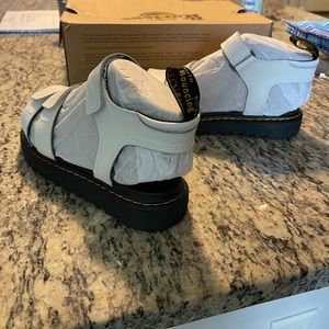 Dr. Martens size 5 kids. White. Never worn. Brand new.